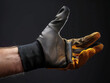 hand in a work glove, concept image occupational safety and protection