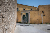 Fototapeta  - Traditional old houses and in Archanes village in Herakleio, Crete. Street view