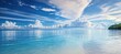 © RocknRoller Studios - Peaceful Tropical Seascape with Turquoise Waters and Blue Skies. Summer Ocean Panorama with White Fluffy Clouds.