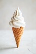 Vanilla Soft Serve Ice Cream Cone Against a Clean  Background