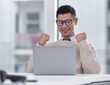 Fist pump, laptop and businessman in office with winning, job promotion or career achievement. Happy, technology and male trader with finance stock market on computer for celebration at workplace.