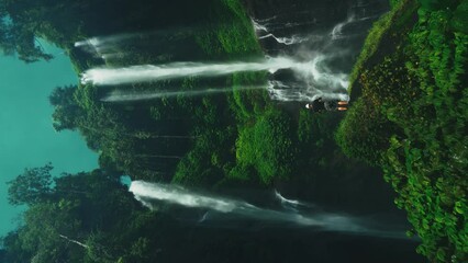 Wall Mural - Travel people enjoy beautiful Sekumpul waterfall Bali the tallest and most beautiful waterfall in Bali Indonesia 4K