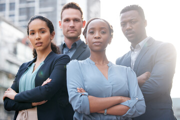 Wall Mural - Portrait, outdoor and serious people for business with teamwork, lens flare and cooperation with solidarity. Corporate staff, crossed arms and partnership in city with collaboration and group support