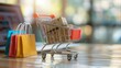 © HelenP - Miniature Shopping Cart with Packages
