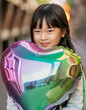 © takayuki_n82 - ハート形のバルーンを抱きしめる少女