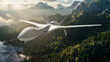 Autonomous drone glides over a lush forest at the golden hour.