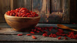 © 沈军 贡 - Rich red color of dried goji berries arranged on a rustic wooden table