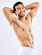 © peopleimages.com - Muscle, man and shower with towel for hygiene on studio background thinking of skincare in mockup. Beauty, model and person grooming with cosmetics in healthy routine for self care and happiness