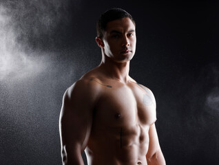 Sticker - Man, portrait and fitness abs in studio for wellness or body builder, strong and dark for power or strength. Person, six pack and smoke with muscle, isolated and black background for aesthetic shadow