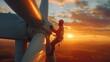 Technician working on a wind turbine at sunset, highlighting the importance of renewable energy maintenance.