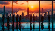 Silhouettes of business people gazing at a vibrant sunset over a bustling cityscape from a high-rise office window