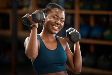 Wall Mural - Black woman, smile and portrait with dumbbell for fitness muscle, wellness or body health challenge. Face, strong or bodybuilder weightlifting for exercise, workout or power for energy in sport club