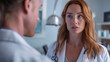 © Esther - Female doctor in a doctor's coat with a stethoscope talking to male doctor