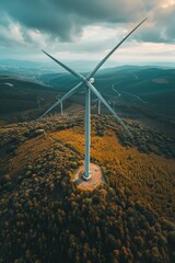 Wall Mural - Wind turbines on a lush green field, suitable for renewable energy concepts