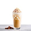 A cup of coffee with whipped cream and cinnamon on top. The whipped cream is piled high on top of the coffee, creating a beautiful and delicious-looking drink. The cinnamon adds a warm.
