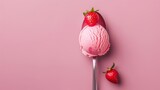 Fototapeta  - Top view of a pink strawberry ice cream ball in a spoon