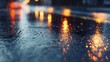 A close-up of wet asphalt reflecting street lights on a rainy night, focusing on the texture and reflections. 