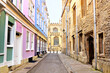 Colorful pastel buildings on a street in the University district of Oxford, England