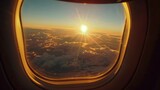 Fototapeta  - sunrise or sunset view from plane window, tourism and travel concept