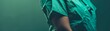 © kitidach - Simple yet poignant shot of a patients torso in green, conveying calmness and care within the healthcare environment