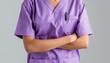 Medical staffs torso in light purple scrubs, presented without any distractions, ideal for healthcare educational materials