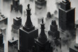 Two chess kings stand atop skyscrapers, overlooking a foggy cityscape in a blend of game and reality - AI Generated