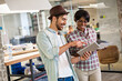© Geber86 - Two diverse young office workers using tablet together