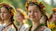 Amidst the vibrant colors of Latvia s summertime you ll catch sight of Latvian folk girls in their traditional attire embodying the essence of Latvia during the Ligo holiday a celebration t
