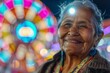 Smiling senior woman with glowing Ferris wheel bokeh lights in the background at night