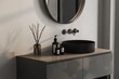 Chic bathroom setup with soap dispensers, towels, plant, black-framed mirror, pendant light, and beige walls. Ideal for showcasing your products in a stylish and modern setting