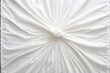 Intricate white cloth folds
