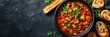 Minestrone soup with breadsticks, fresh food banner, top view with copy space