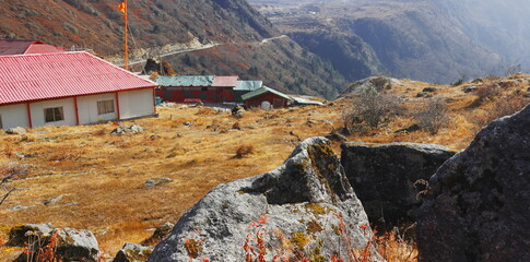 Wall Mural - remote mountain village, surrounding forest and wilderness, beautiful high himalaya mountains region of sikkim in autumn season, india