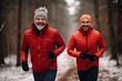Two friends during a short morning run through the winter forest. Pleasant communication and running workout in a pleasant company. Support and friendship concept.