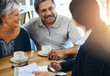 © peopleimages.com - Senior couple, discussion and financial advisor with documents for retirement plan, budget advice and will at home. Old man, elderly woman and attorney with paperwork, negotiation and legal agreement