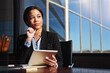 © peopleimages.com - African lawyer, woman and thinking with tablet, solution and decision for compliance at commercial law firm. Person, advocate or attorney with idea on touchscreen for legal report with app in office