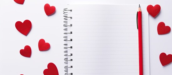 Fototapete - An isolated copy space image of a notebook adorned with red pen and heart designs on a white background