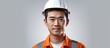 © HN Works - An Asian worker posing for a portrait with a clean white background in the copy space image