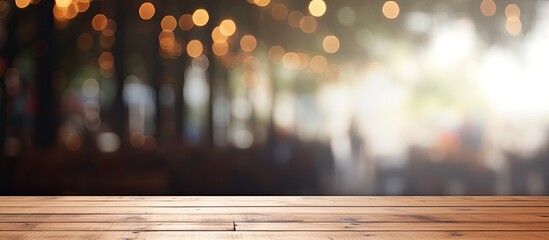 Leinwandbilder - Coffee shop blur background with bokeh and an empty wooden table providing copy space for images