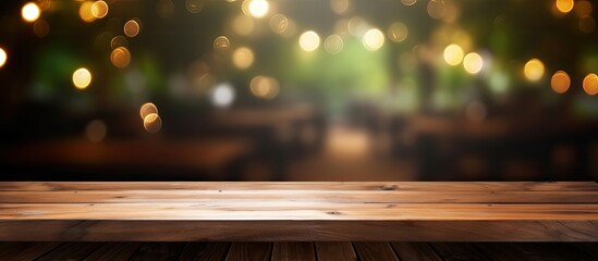 Leinwandbilder - Coffee shop blur background with bokeh and an empty wooden table providing copy space for images
