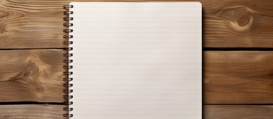 Aufkleber - A wooden background with a blank notebook and a pencil offering ample space for writing or drawing