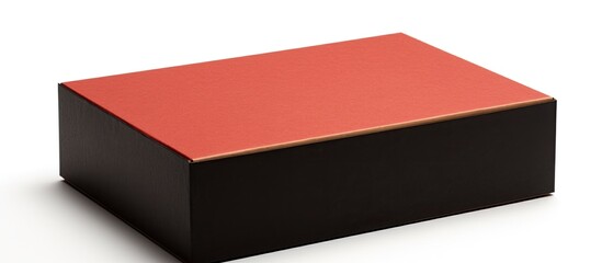 Wall Mural - A small handmade cardboard box with a red and black color scheme is isolated on a white background offering a copy space image