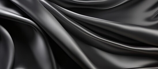 Poster - Abstract background design featuring a luxurious cloth fabric texture in shades of beautiful elegant dark silver grey or black satin silk with ample copy space for images
