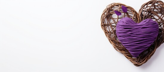 Poster - Above the flat lay image there is a purple heart shaped rattan placed in isolation on a white background with ample copy space