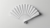 Fototapeta  - Mockup of a white folding hand fan set apart against a white background