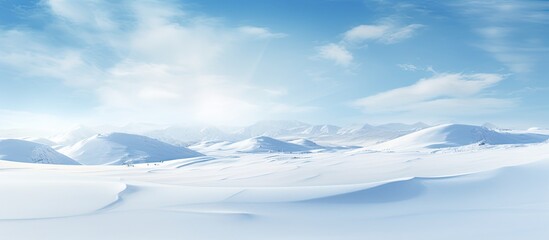 Poster - Winter landscape with snowy ground and wind sculpted patterns on the snow surface creating a wide panoramic background The natural snow texture adds to the beauty of the copy space image