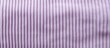 A textured background with a pastel purple corduroy textile perfect for using as a copy space image
