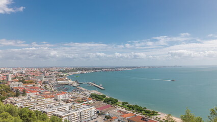 Wall Mural - Panorama showing aerial view of marina and city center timelapse in Setubal, Portugal.