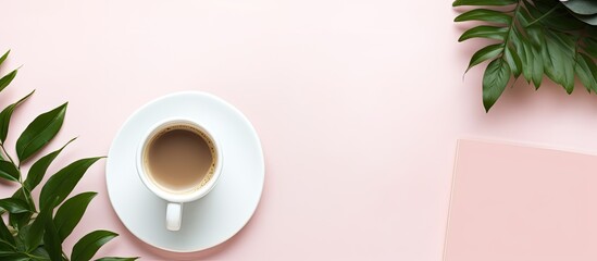 Fototapete - Top view of a beautifully arranged workspace desk with a coffee cup and a notebook This feminine and creative flat lay photo includes copy space