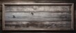 A gray weathered wooden backdrop with three blank frames nailed onto it Copy space image
